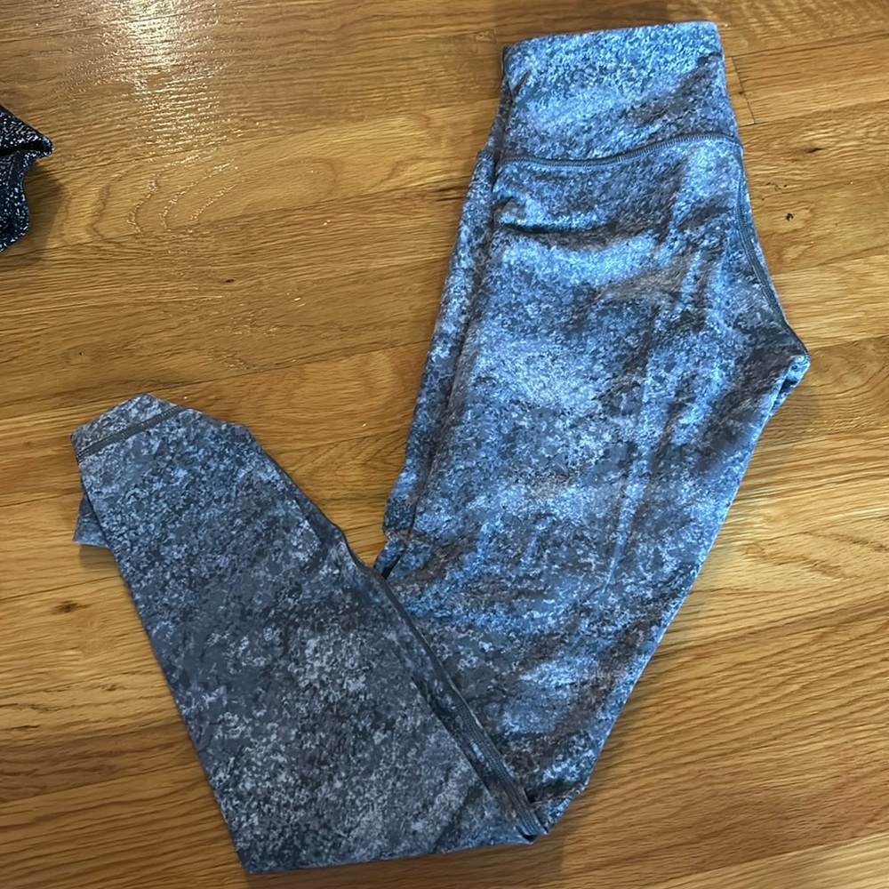 Lululemon size 4 leggings. Barely worn like new. Gray design